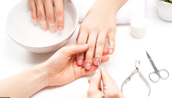 What is a manicure? It's a nail care service that generally involves a professional filing, shaping, and painting the nails.